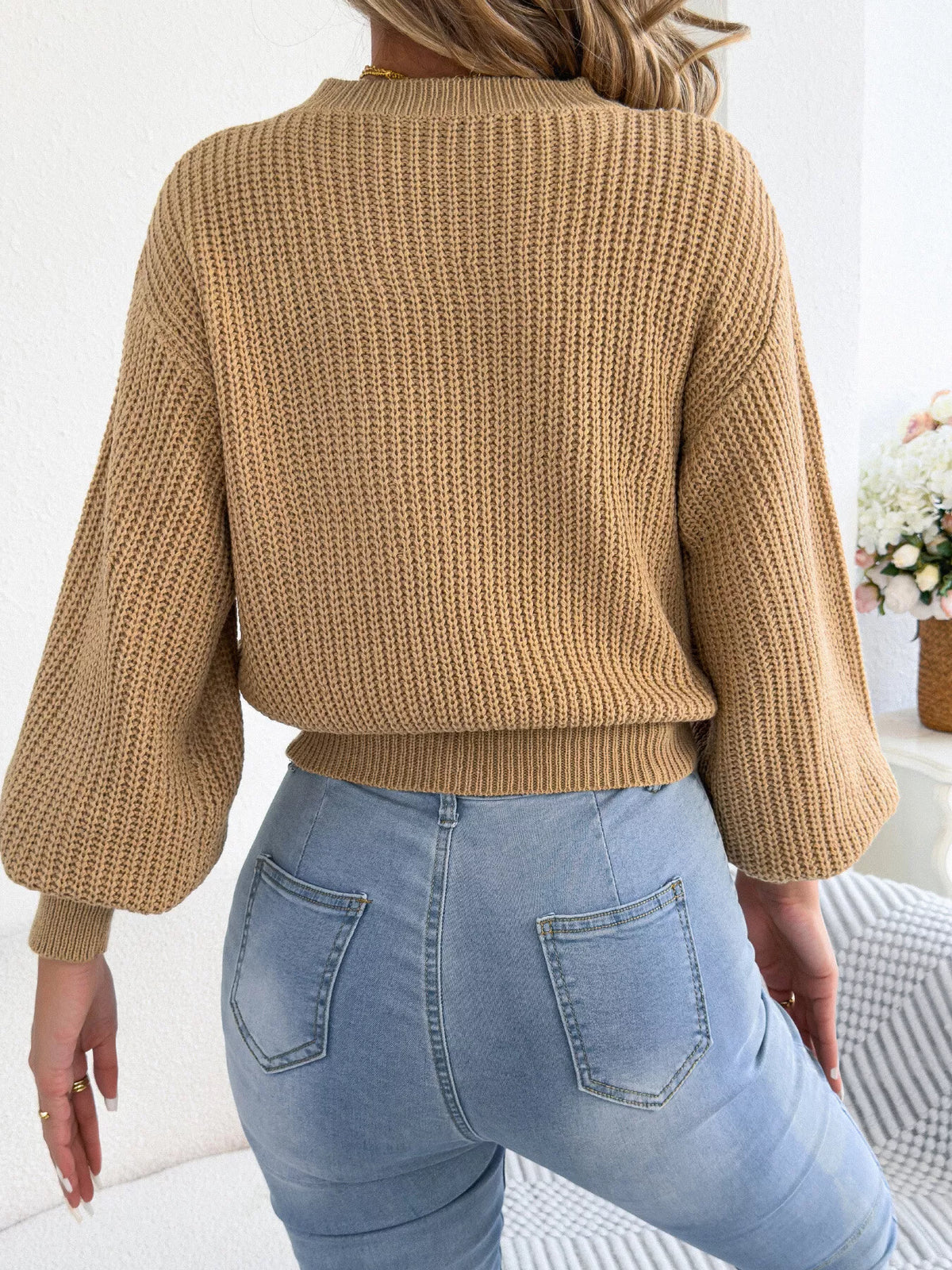 Khaki back view of argyle knit lantern-sleeve sweater with ribbed hem
