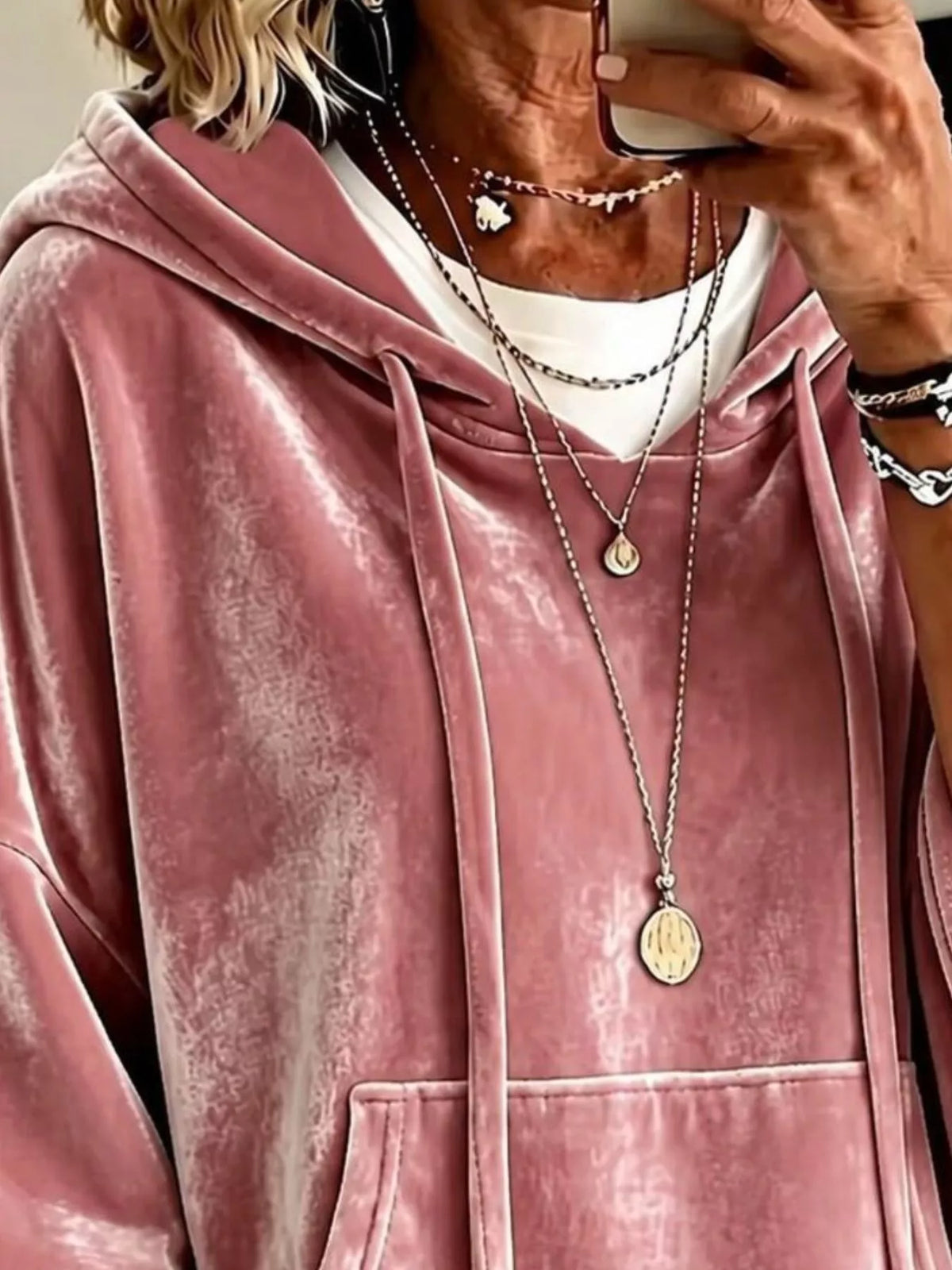 Pink velvet hoodie with hood, kangaroo pocket, and drawstring front cords