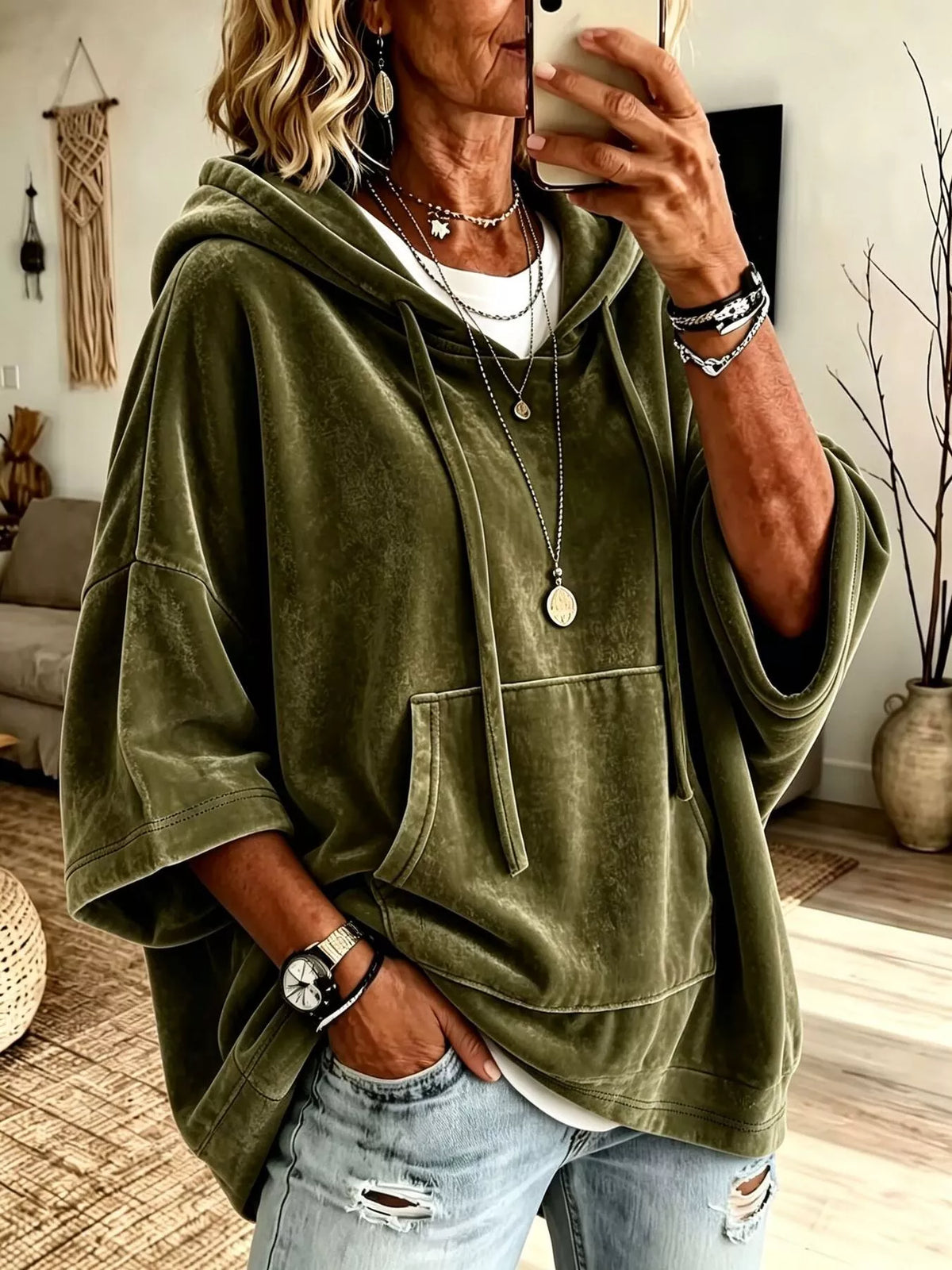 Olive velvet kangaroo pocket hoodie with hood, half sleeves, and drawstring.