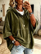 Olive velvet kangaroo pocket hoodie with hood, half sleeves, and drawstring.