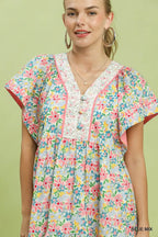 Floral blue mix mini dress with V-neck bodice and ruffled tiered skirt