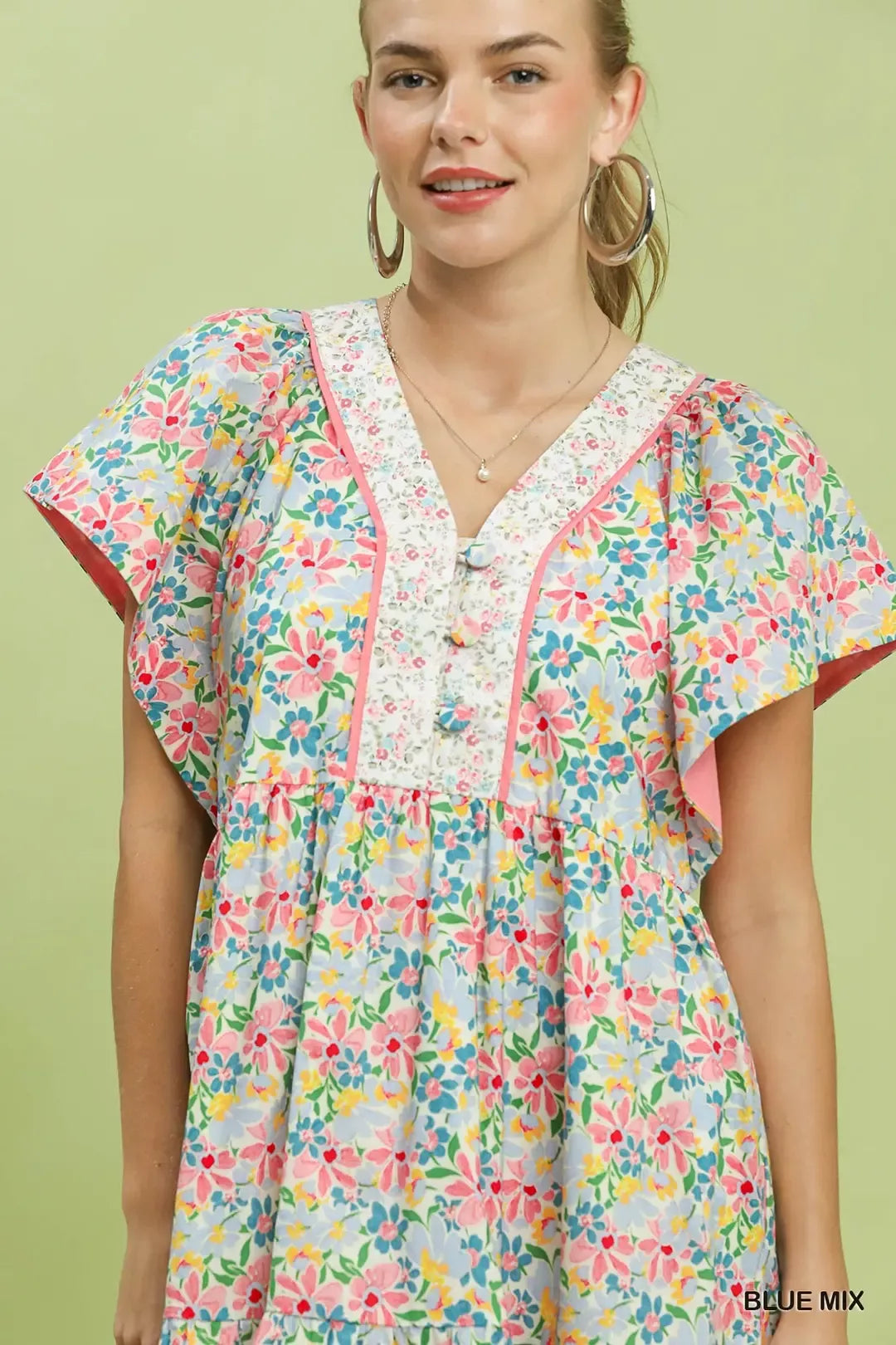 Floral blue mix mini dress with V-neck bodice and ruffled tiered skirt