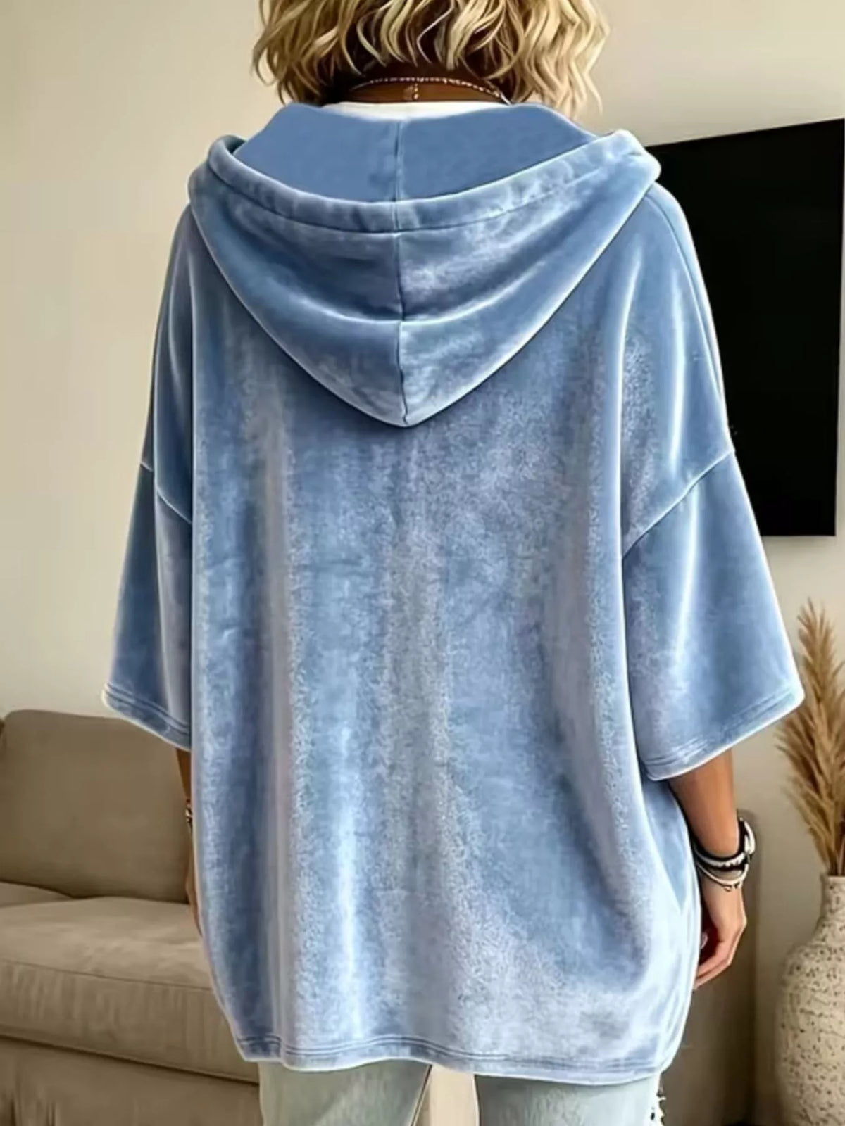 Light blue velvet hoodie back view with hood and short sleeves, relaxed fit.