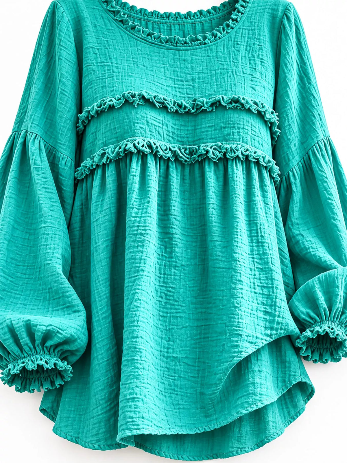 Teal peplum blouse with frayed trim and ruffled smocked neckline