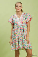 Floral mini dress in blue mix with V-neck, tiered ruffle hem and flutter sleeves