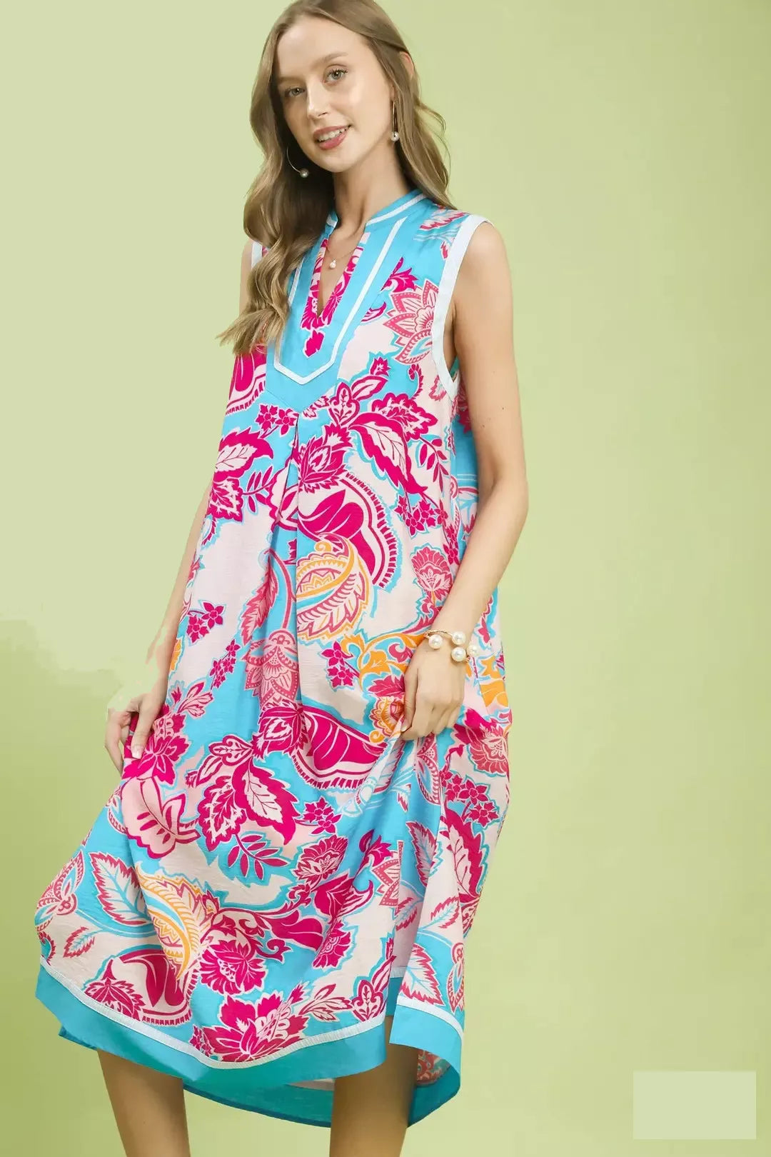 Floral sleeveless midi dress, blue with bold pink botanical and paisley pattern