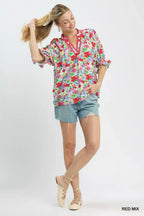 Red-and-blue mixed floral ruffle top with elbow-length ruffle sleeves and V-neck