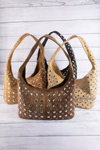 Studded shoulder bag set with brown, black, and tan designs and silver grommets