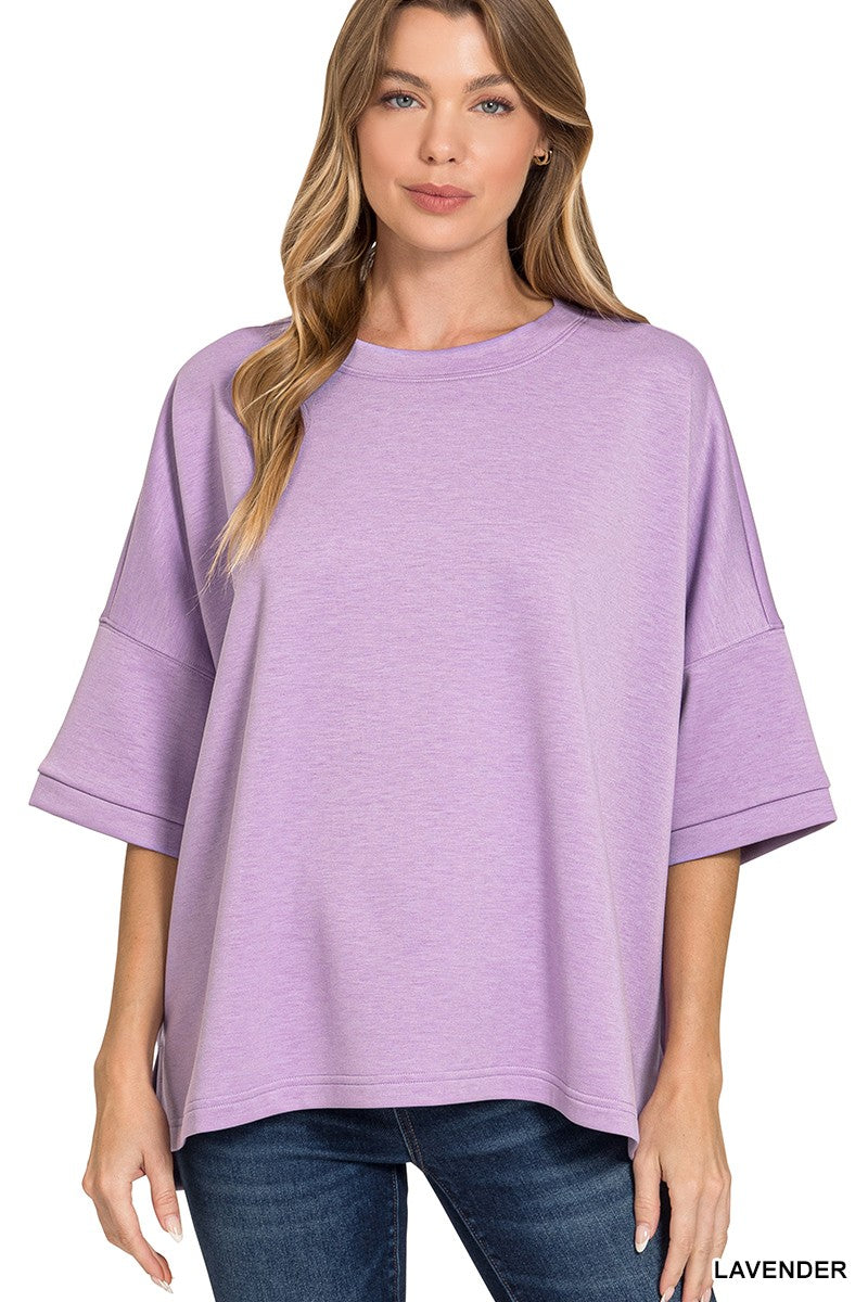 Lavender scuba round-neck top with relaxed fit and short sleeves