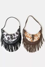 Cow print faux leather fringe hobo bag, black and brown options with shoulder strap