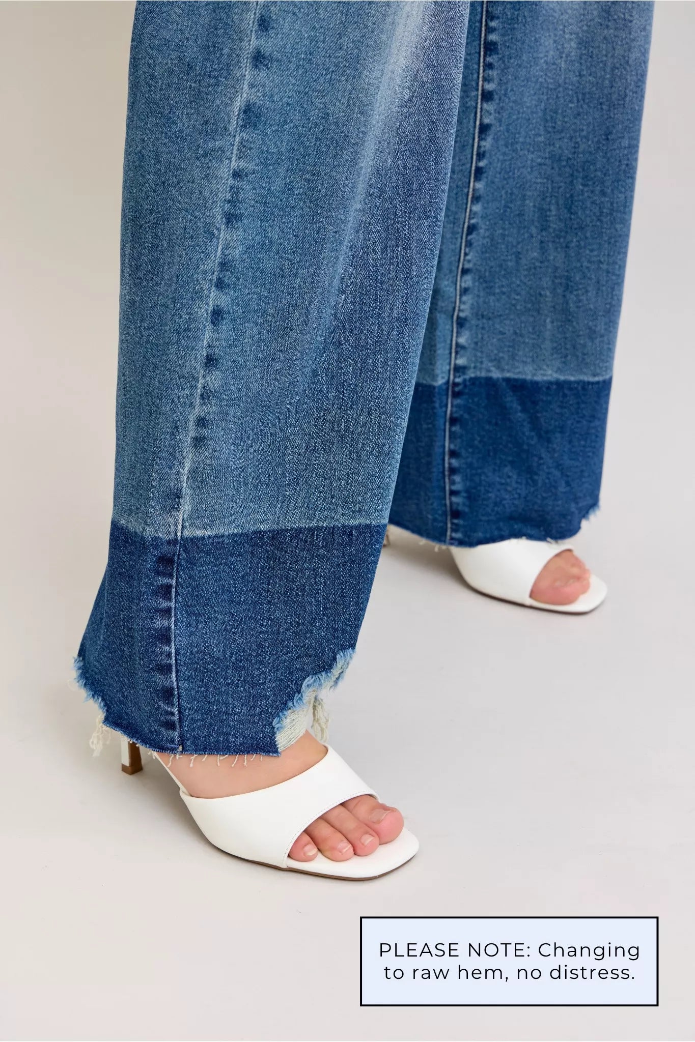 High-waist straight jeans, medium blue denim with raw hem and side seam stitching