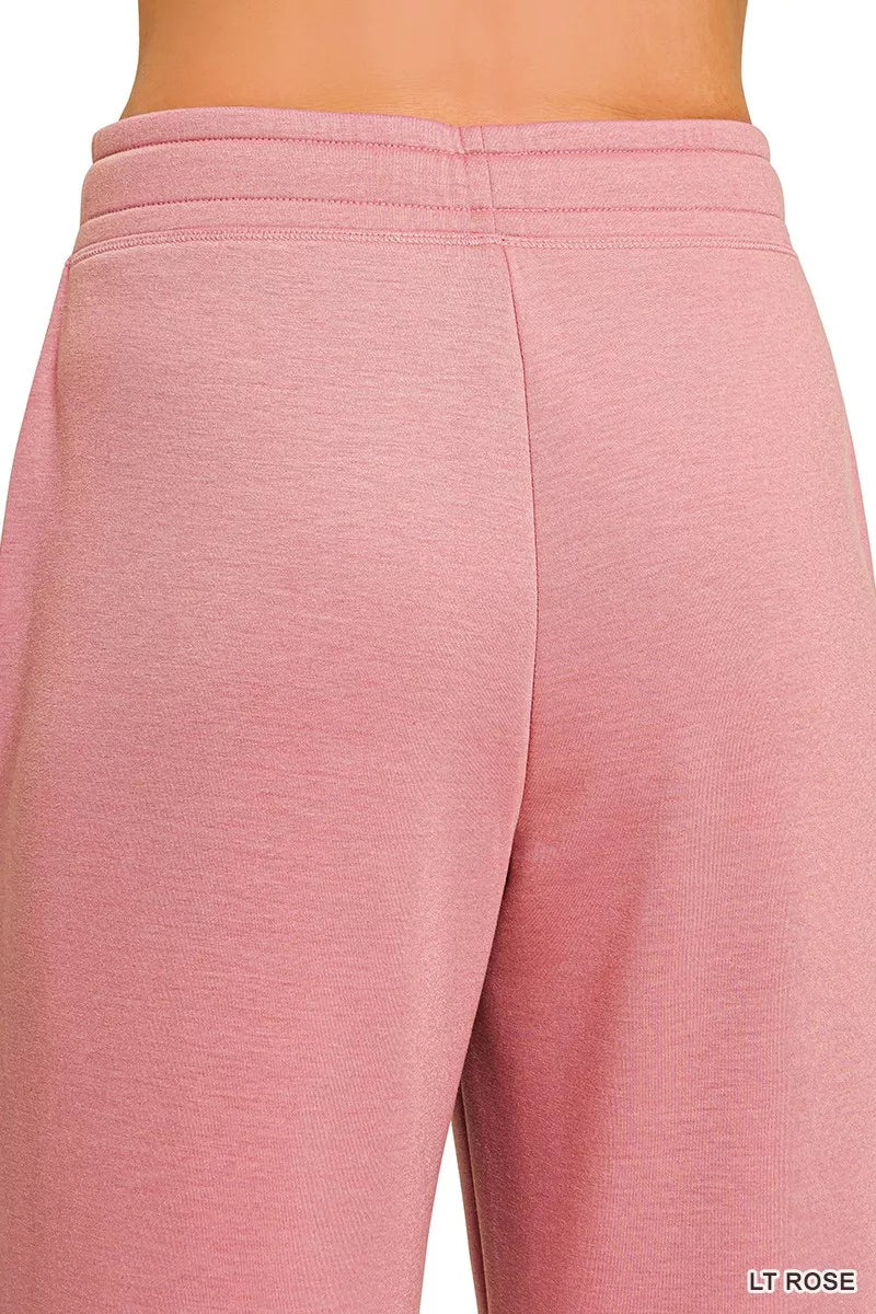 Light rose joggers with back seam and elastic waistband