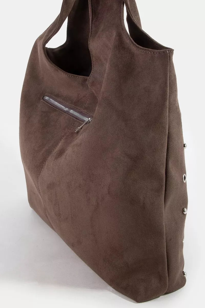 Suede shoulder tote in dark brown with adjustable strap tab and metal accent hardware