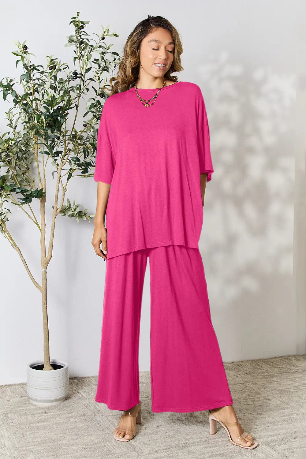 Hot pink two-piece top and wide-leg pants set, round neck, slit hem