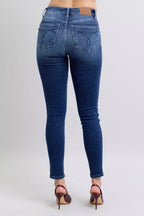 Washed dark blue skinny jeans, high-rise waistband, rear patch pockets