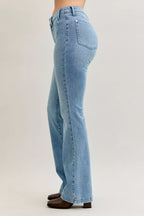 Light blue mid-rise bootcut jeans with rear pocket and back yoke seam