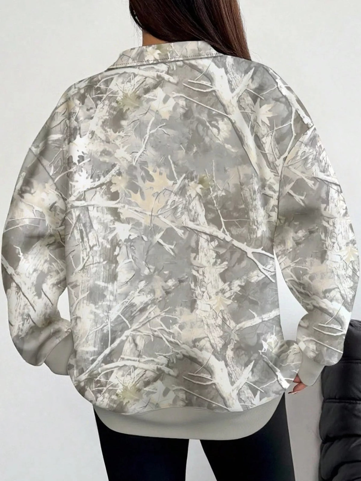 Oversized zip-neck sweatshirt, white-and-gray camouflage print, back view