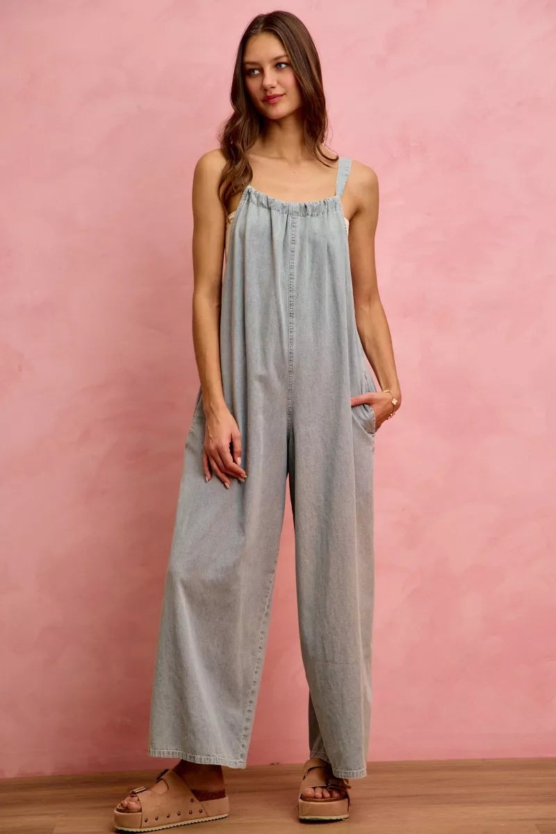Light blue denim wide-leg overalls with square neckline and spaghetti straps