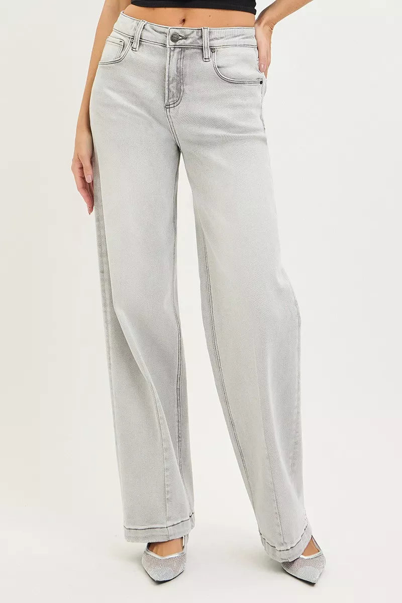 Light grey baggy jeans with front pockets and relaxed wide leg opening