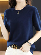 Navy crew-neck short-sleeve sweater with ribbed cuffs and hem