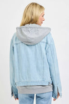 Oversized hooded light-wash denim jacket, rear view with kangaroo pocket and seams