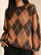 Fuzzy argyle knit sweater with brown, rust, and white diamond pattern; long sleeves.