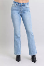 Light wash mid-rise bootcut jeans with back pockets and classic five-pocket design