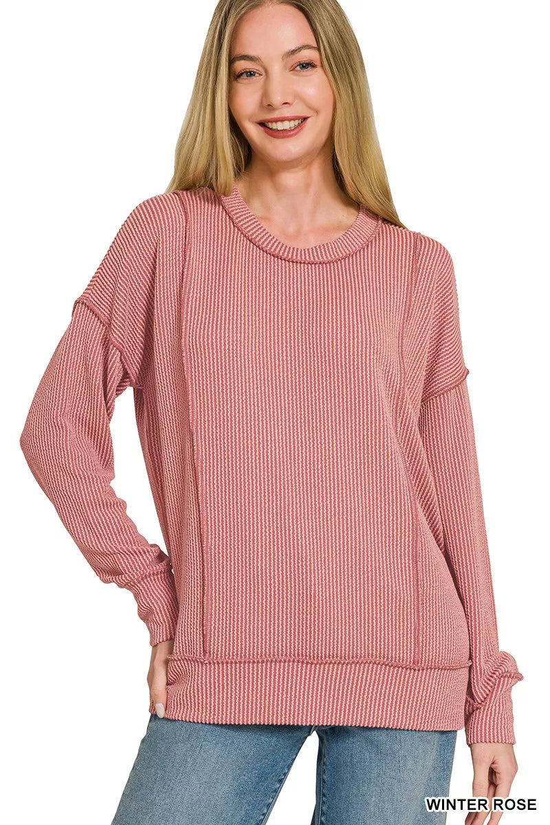 Dusty rose corded rib long sleeve top, side view with crew neck and cuffs