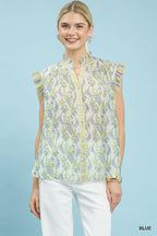 Floral split-neck flutter sleeve top in light blue with ruffled neckline