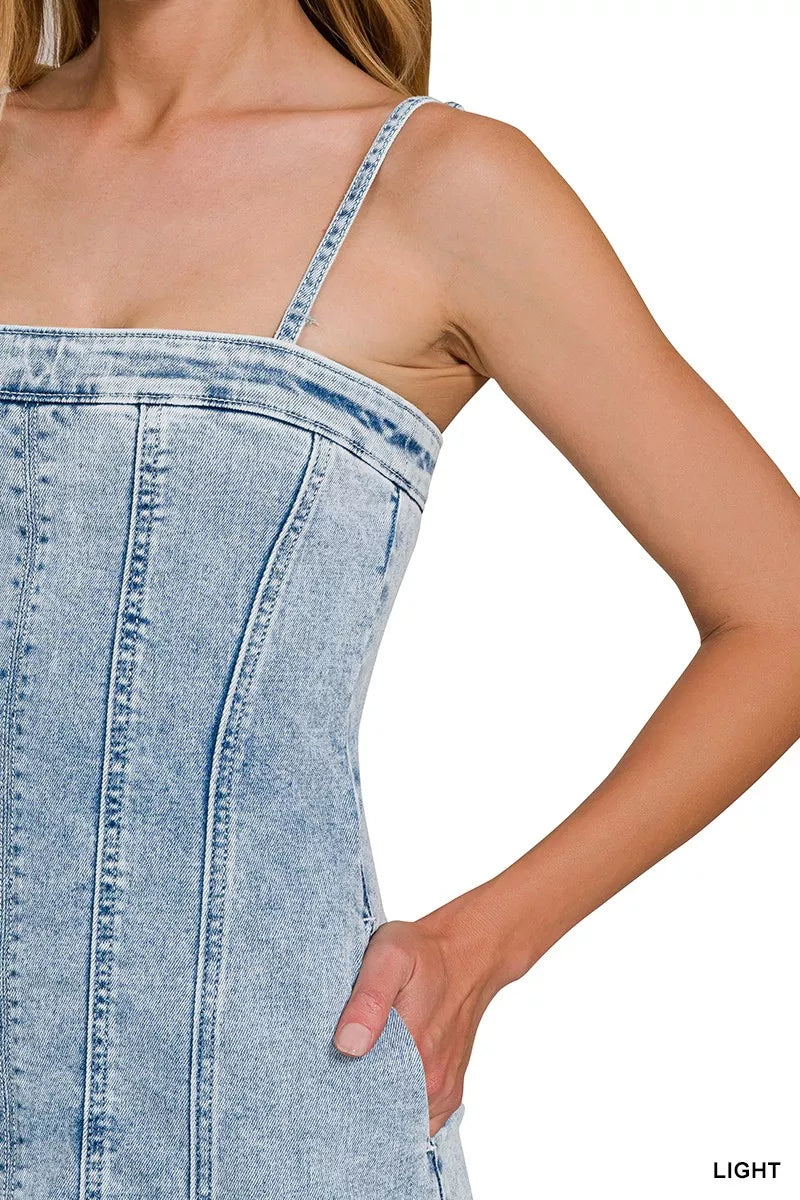 Light wash denim bodice with spaghetti straps and exposed vertical seam stitching