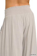 Sand beige smocked elastic waistband on wide-leg lounge pants