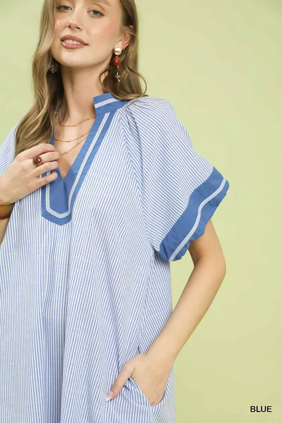 Blue pinstripe midi dress with V-neck contrast trim and short flutter sleeves