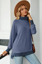 Light blue mock-neck long-sleeve slit tee with contrast hem band, front view