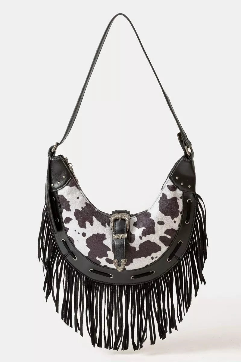 Cow print faux leather fringe hobo bag, black strap, crescent shoulder style