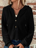 Black waffle-knit button hoodie with hood drawstrings and snap front placket