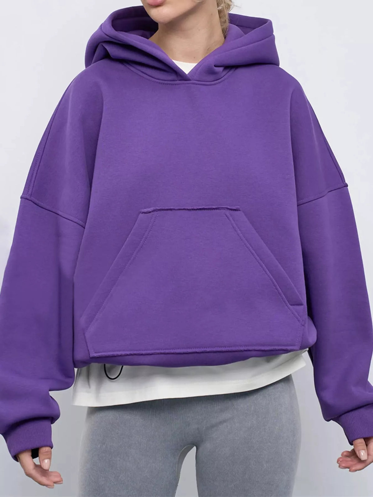 Oversized kangaroo pocket hoodie with hood, purple front pocket detail