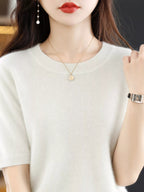 White round-neck short-sleeve sweater with ribbed crew neckline