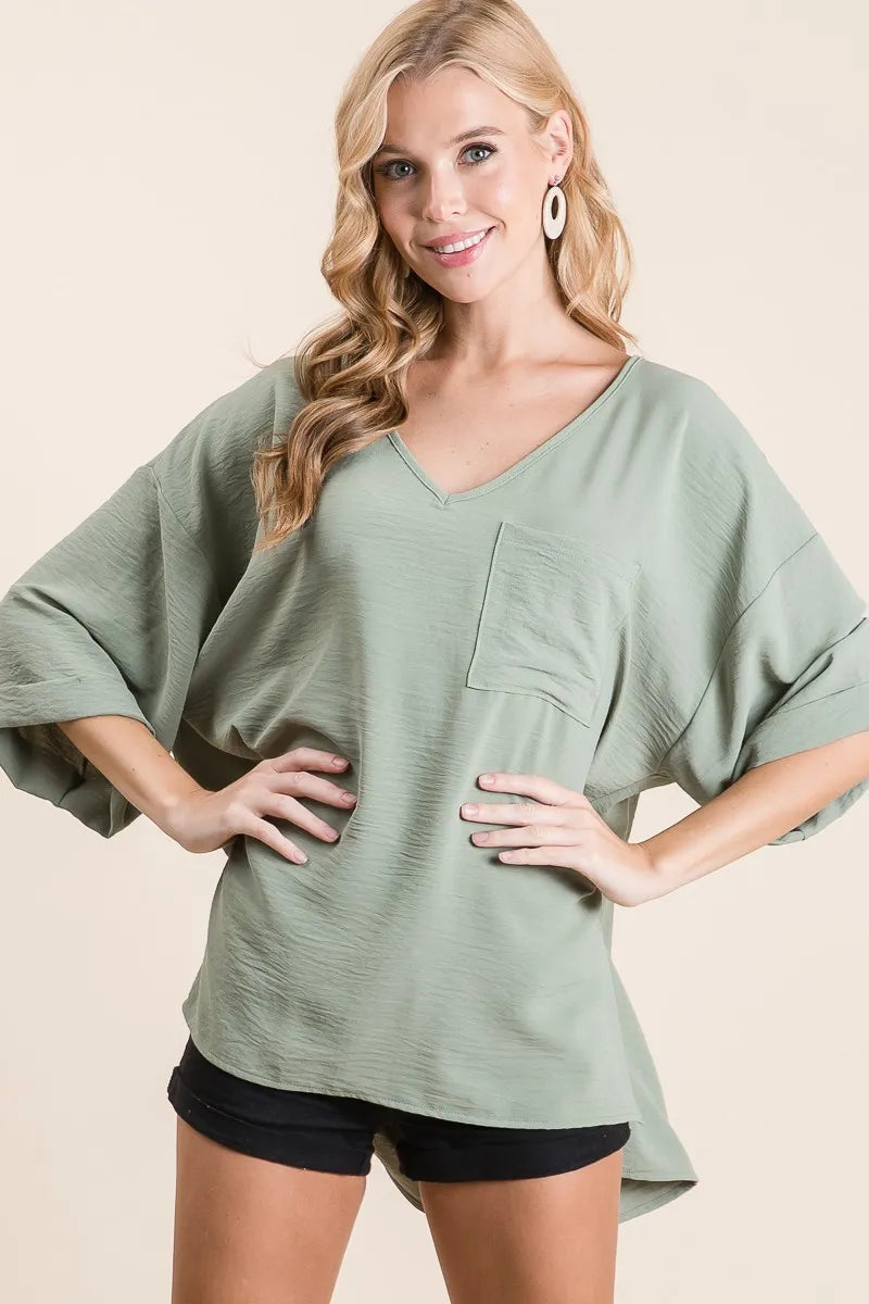 Sage Green Oversized V-Neck Blouse – High-Low Hem & Chest Pocket