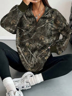 Dark army green camo zip-neck oversized sweatshirt, half-zip collar and long sleeves