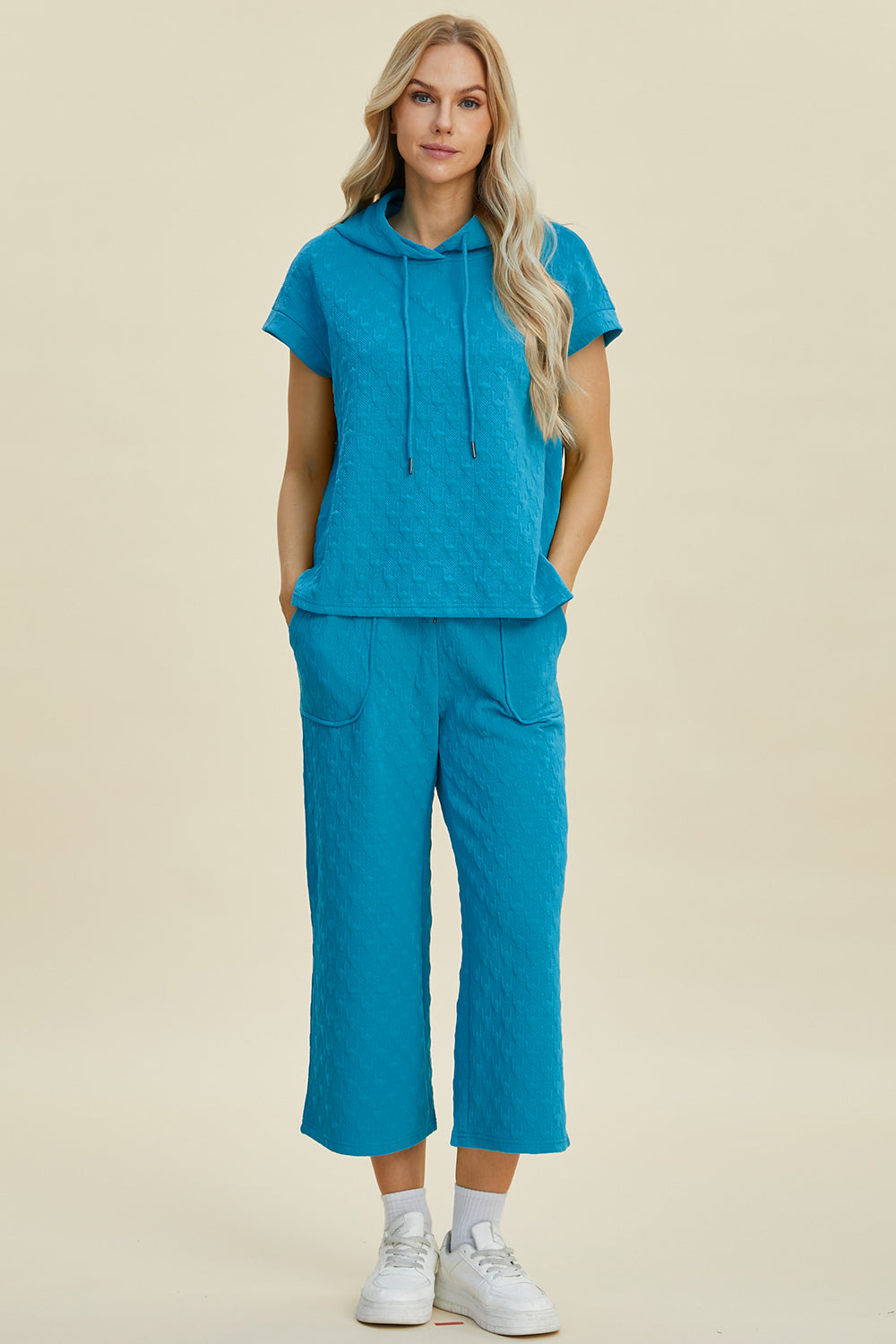 Cerulean textured short-sleeve hoodie set with drawstring hood and wide-leg pocket pants