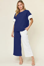 Blue T-shirt and white wide-leg pants set with contrast short sleeves