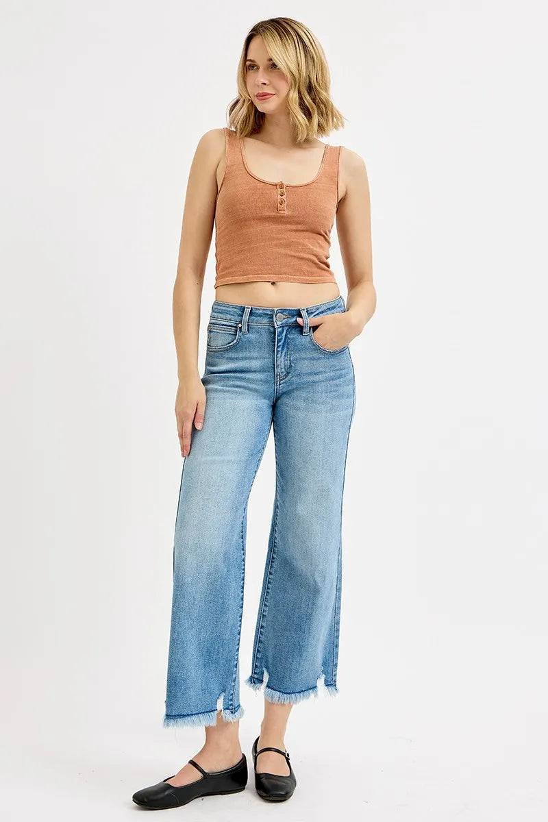 Light blue mid-rise wide-leg crop jeans with frayed hem and front pockets