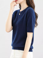 Navy round-neck short-sleeve knit sweater with ribbed collar, cuffs, and hemline