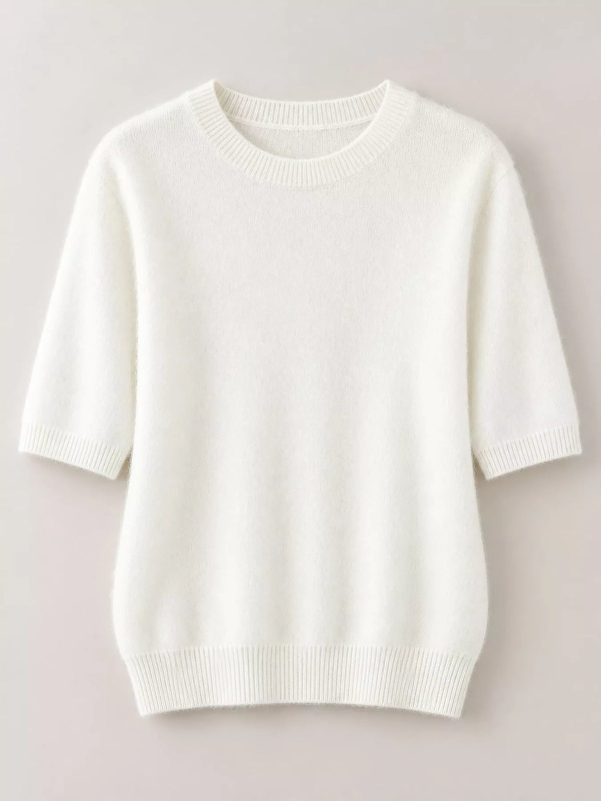 White short-sleeve round-neck sweater, ribbed collar and hem (flat lay)