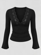 Black lace-trim V-neck long-sleeve tee with lace panel at the chest.