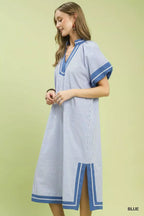 Blue pinstripe midi dress, V-neck and contrast trim, short flutter sleeves, open side seam