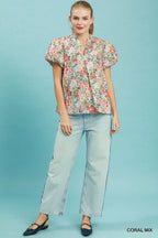 Floral puff-sleeve blouse in coral mix with V-neck and button front, front view