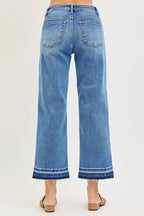 Light blue cropped boyfriend jeans, rear patch pockets, cuffed hem