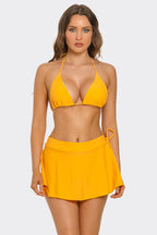 Yellow triangle bikini top with swim skirt, halter ties at neck and back
