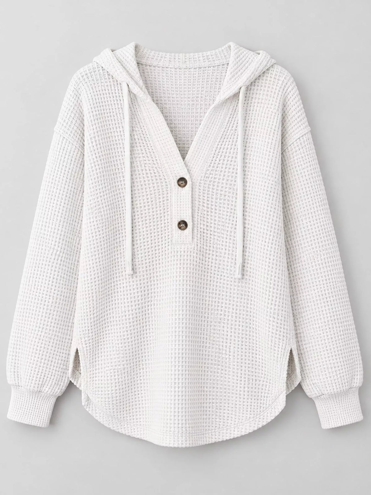 White waffle-knit button hoodie with hood, long sleeves, and two front buttons.